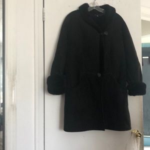 Shearling, black cuffed sleeves with pockets